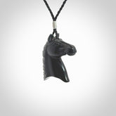 This medium sized horse pendant is made from Australian Black Jade. We've hand carved this piece for all the horse lovers out there. Free postage worldwide. Black Jade Stone horse head jewellery.